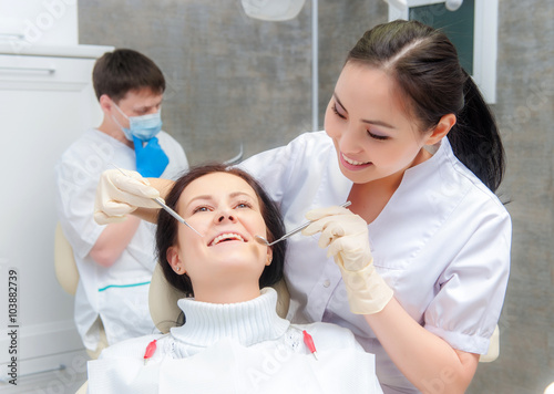 Female patient with open mouth photo