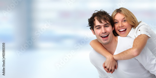 Free Download Young smiling couple. - GFXLoad