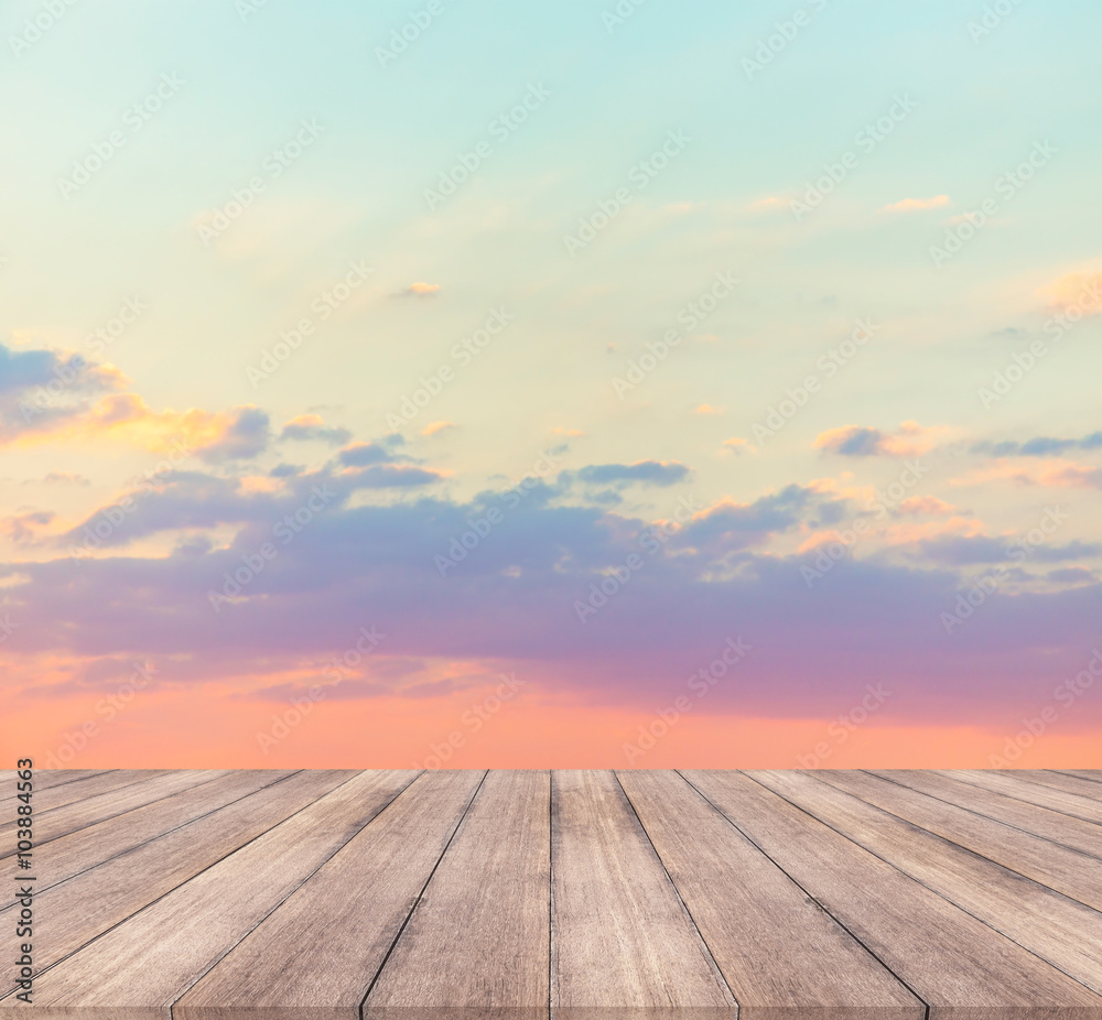  wooden floor and beautiful sunset or sunrise blurred background  