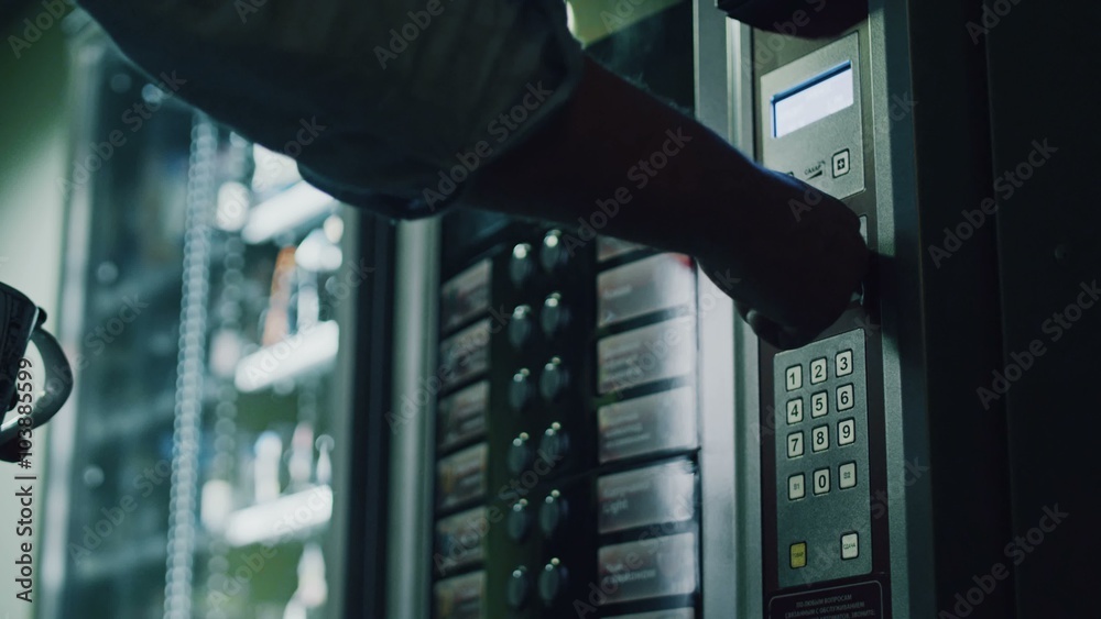 Choosing a food from the vending machine