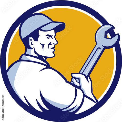 Mechanic Holding Monkey Wrench Circle Retro