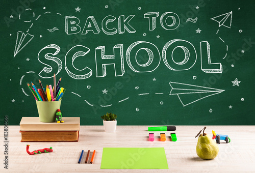 Back to school blackboard and student desk