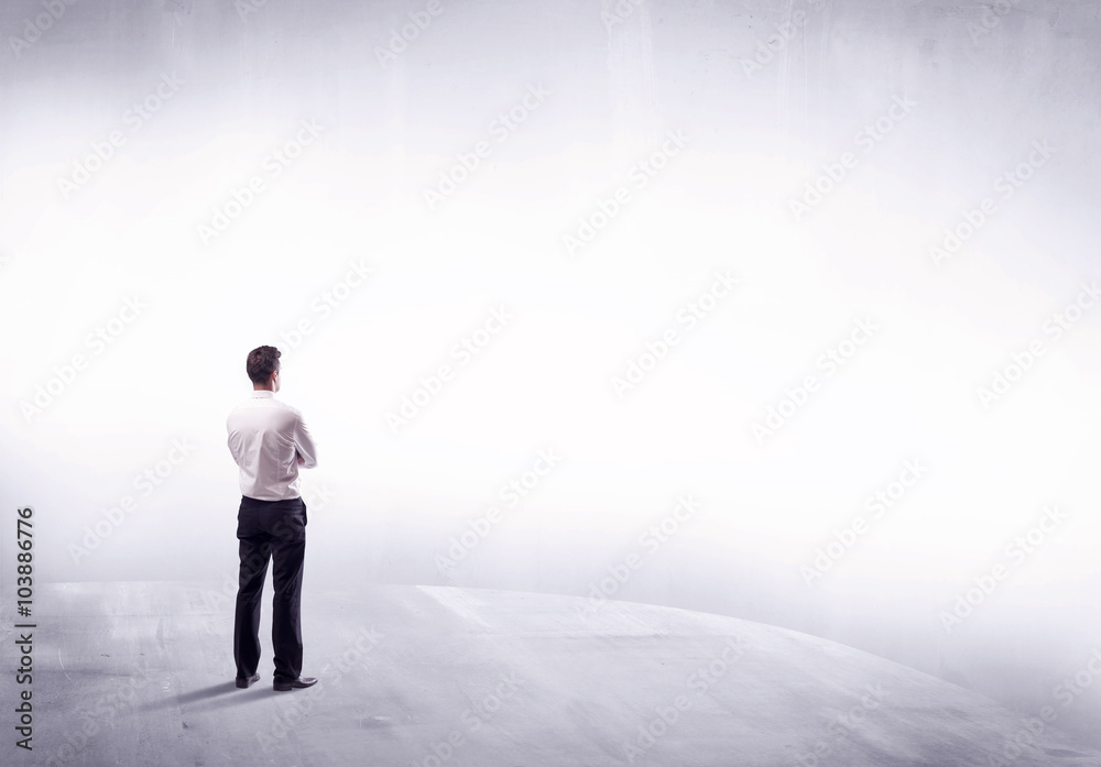 Business person standing from rear view Business person standing from rear view