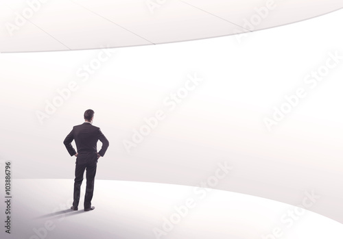 Salesman standing with his back concept © ra2 studio