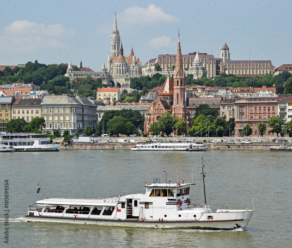 Tourist boat on the rive Danube at Budapest city
