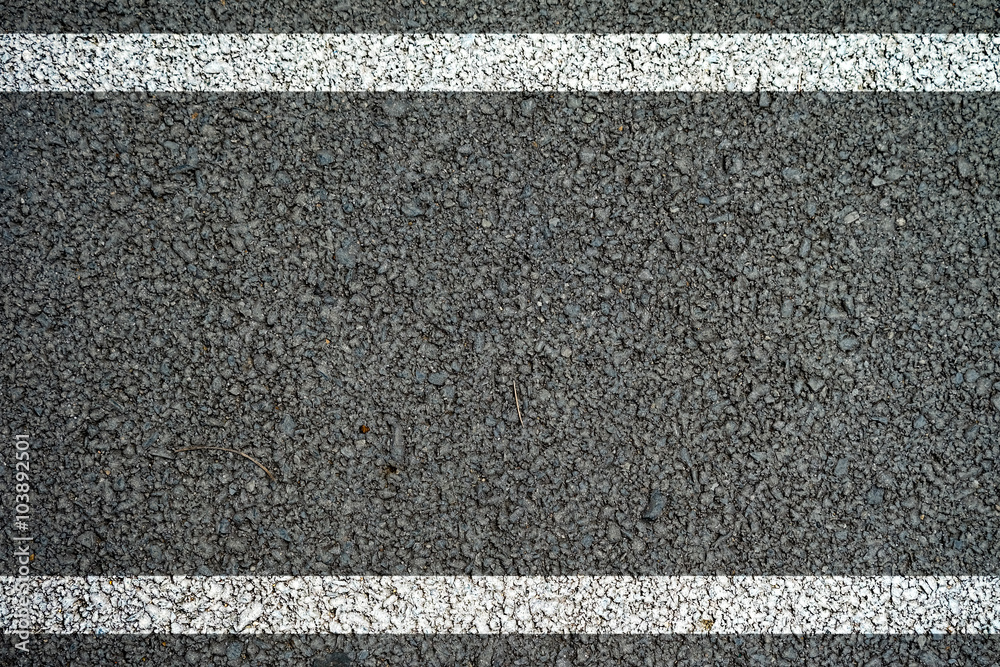 Fototapeta premium The lines on the asphalt road surface.