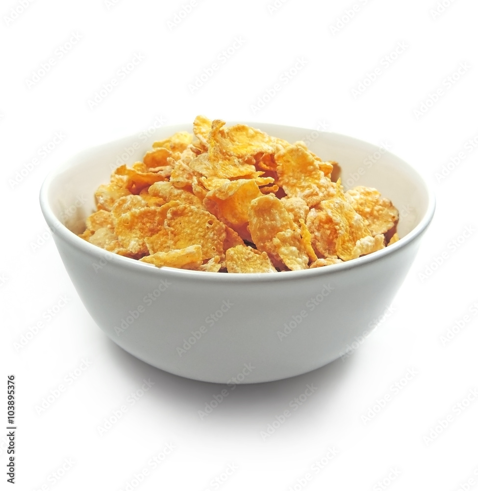 Cornflakes in a bowl, isolated on white Cornflakes in a bowl, isolated on white