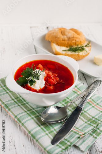 Ukrainian and Russian national red soup borsch with sour cream