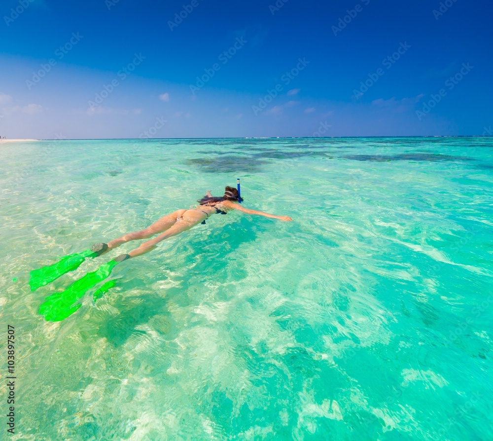 Maldives,  woman snorkeling!