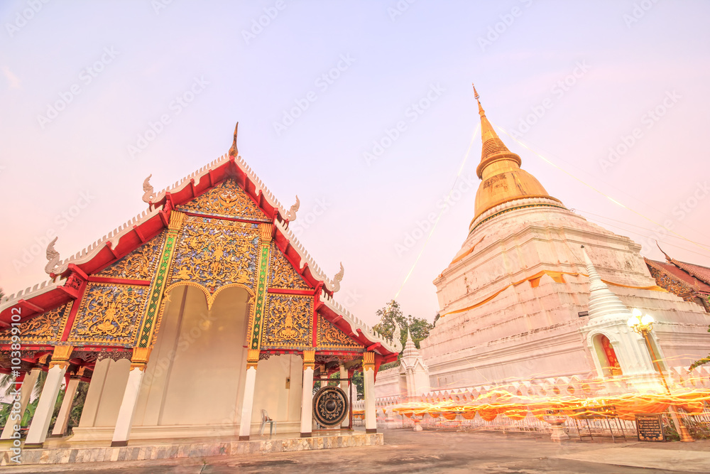 Fototapeta premium walk with lighted candles in hand around a temple,wian tian