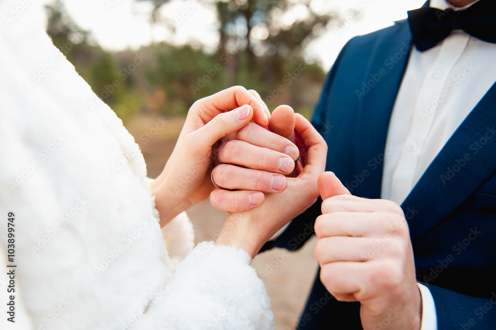 Fototapeta premium Happy love couple holding hands in the morning