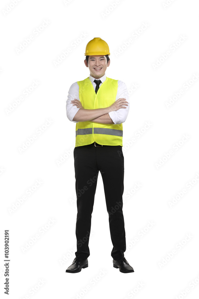 Asian worker wearing safety vest and yellow helmet Asian worker wearing safety vest and yellow helmet
