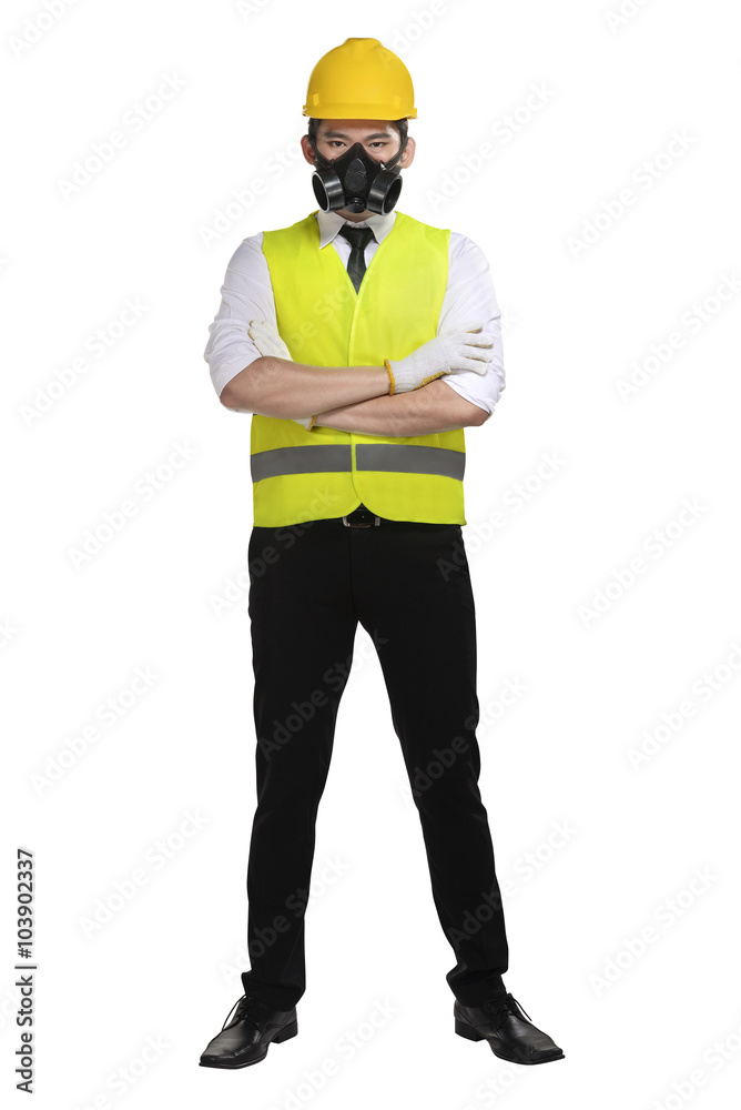 Asian worker wearing safety vest and yellow helmet Asian worker wearing safety vest and yellow helmet