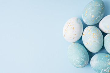 Colorful easter eggs on blue background