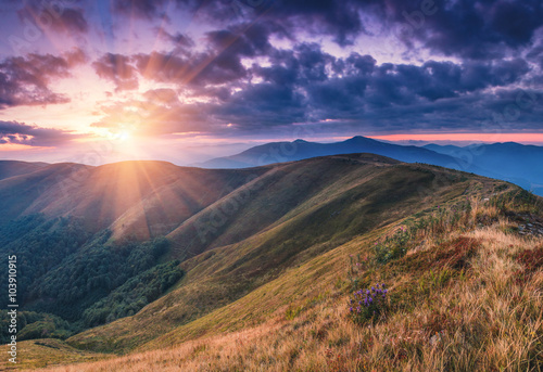 Beautiful sunrise in the mountains landscape. © vovik_mar