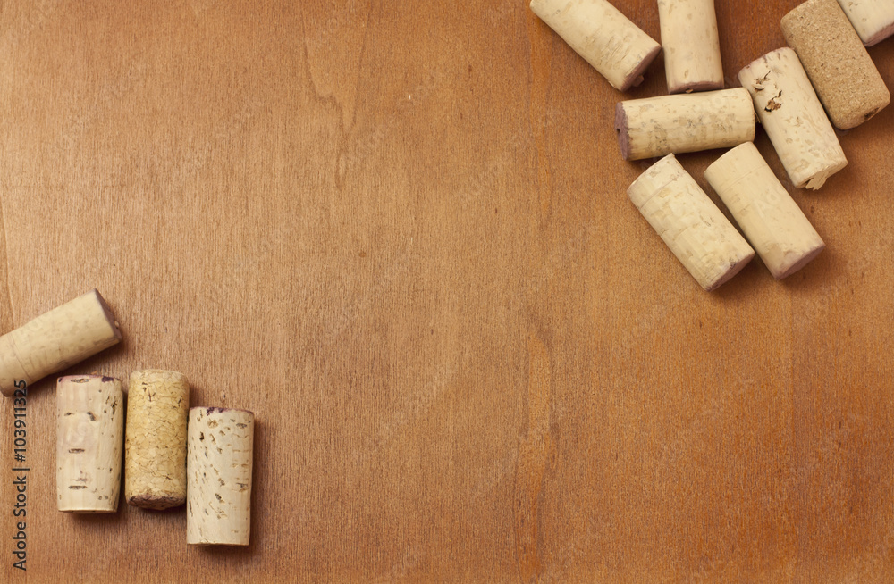 Wine corks on wooden background with copyspace Wine corks on wooden background with copyspace