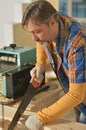man repairing in the room