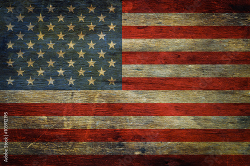 American flag on grunge wooden background