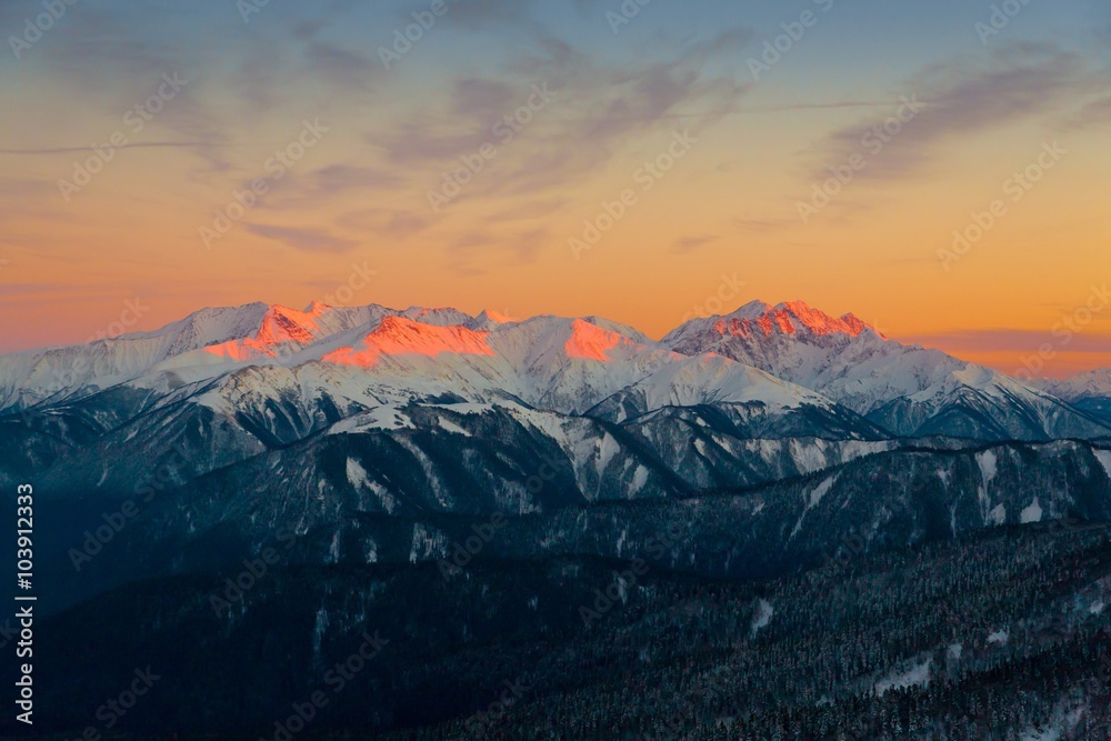 Mountain sunset winter