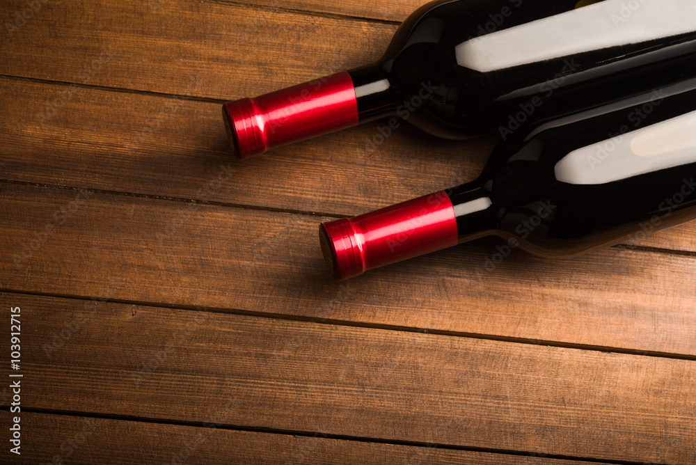 Wine bottles with red wine