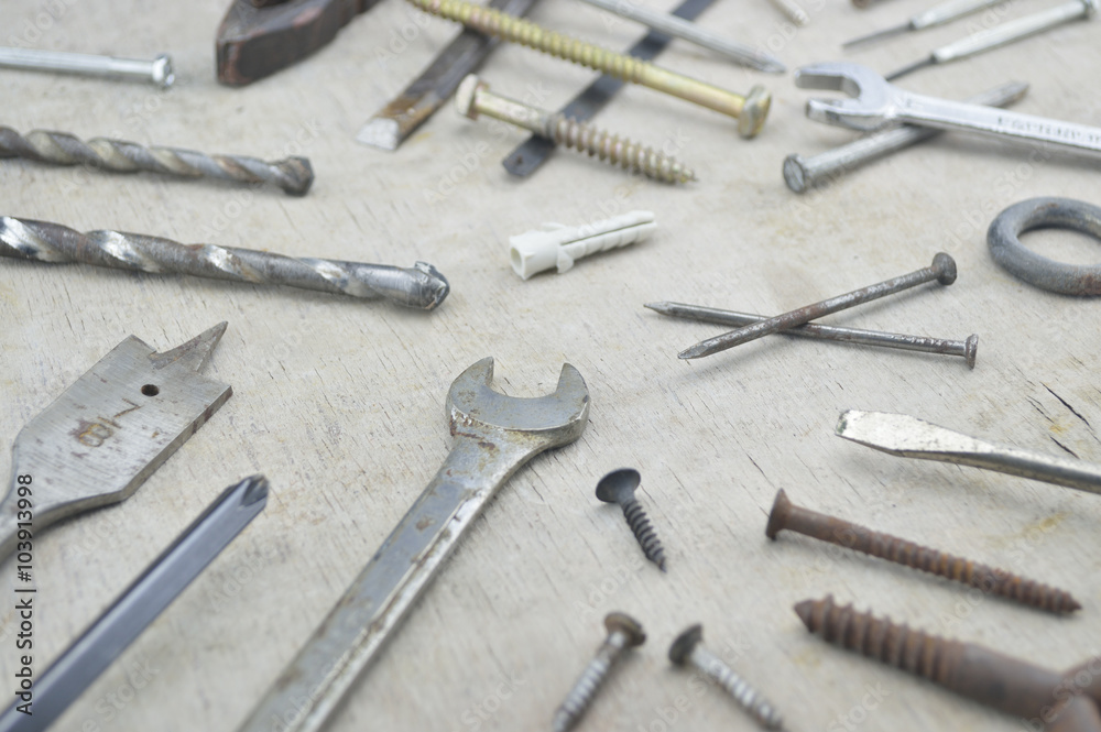 Assorted old work tools on wooden Assorted old work tools on wooden