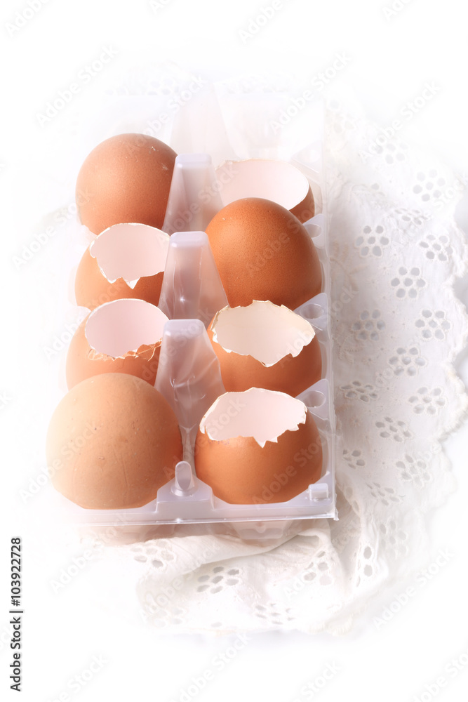 chicken eggs shells on white lace background chicken eggs shells on white lace background
