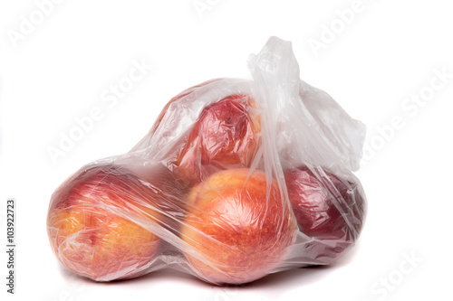 View of some peaches inside a plastic bag. © Mauro Rodrigues