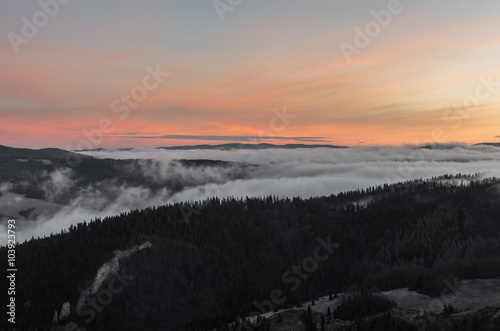 Carpathian mountains in the clouds, sunrise seen from Wysoka mountain in Pieniny, Poland