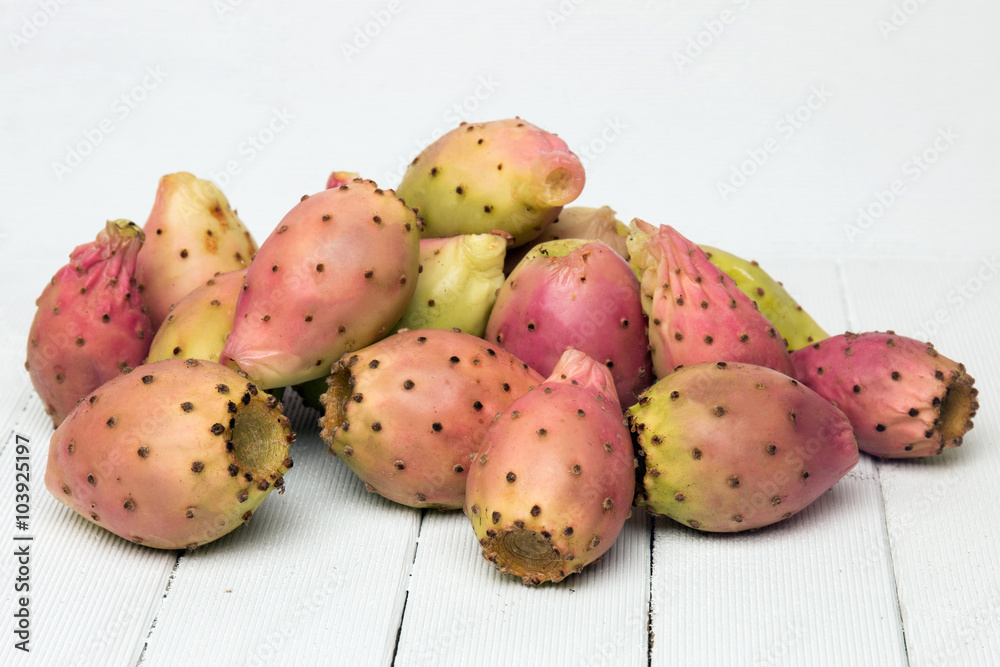 Opuntia ficus-indica cactus fruits on a white background