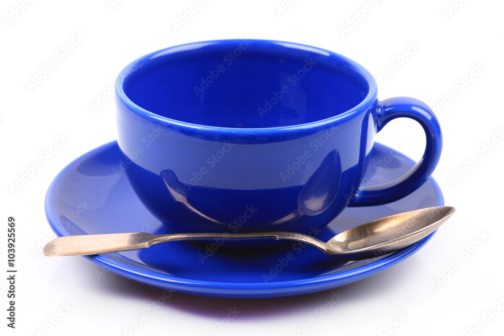blue cup with spoon on white background isolated blue cup with spoon on white background isolated
