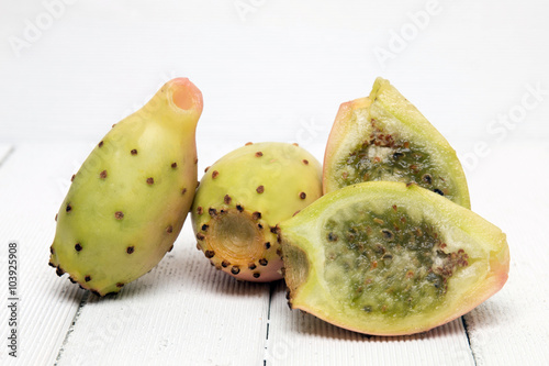 Opuntia ficus-indica cactus fruits on a white background photo