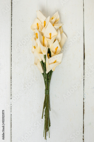 Fake white flowers isolated on a white background.