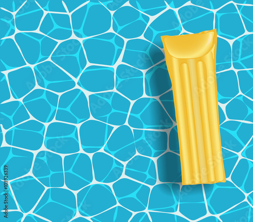 Yellow mattress in the swimming pool sunny day