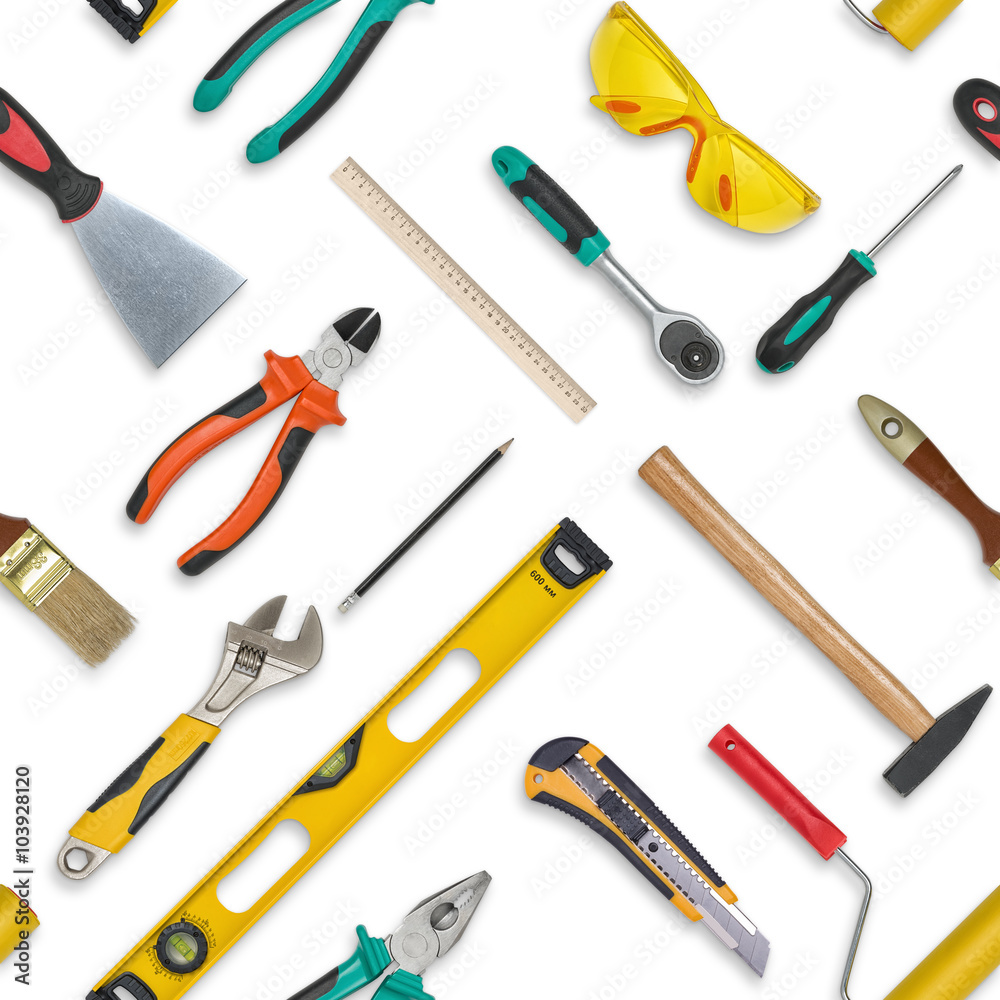 Set of construction tools isolated on a white background. Level,, glasses, wrench, spanner, paint roll, hammer, cutter, pliers. Seamless texture background Set of construction tools isolated on a white background. Level,, glasses, wrench, spanner, paint roll, hammer, cutter, pliers. Seamless texture background