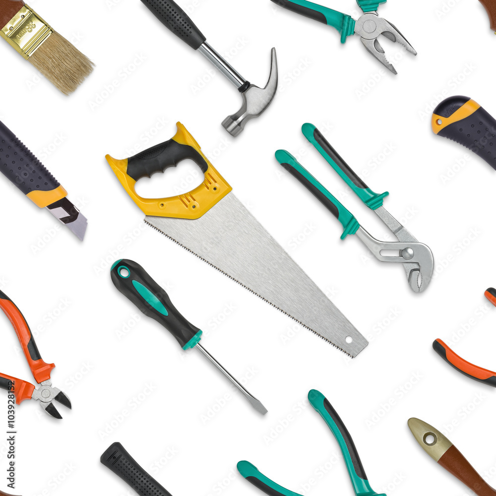 Set of construction tools isolated on a white background. Saw, wrench, spanner, hammer, cutter, pliers, screwdriver. Seamless texture background Set of construction tools isolated on a white background. Saw, wrench, spanner, hammer, cutter, pliers, screwdriver. Seamless texture background