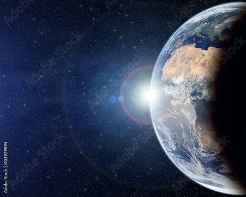 Planet Earth from above with lens flare