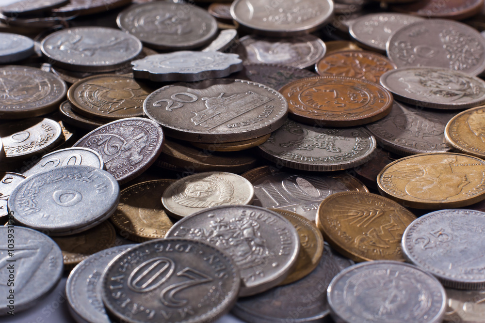 coins different currencies (selective focus used) coins different currencies (selective focus used)