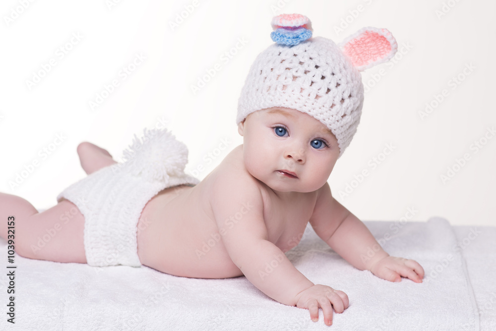 cute baby child in rabbit costume lying down cute baby child in rabbit costume lying down