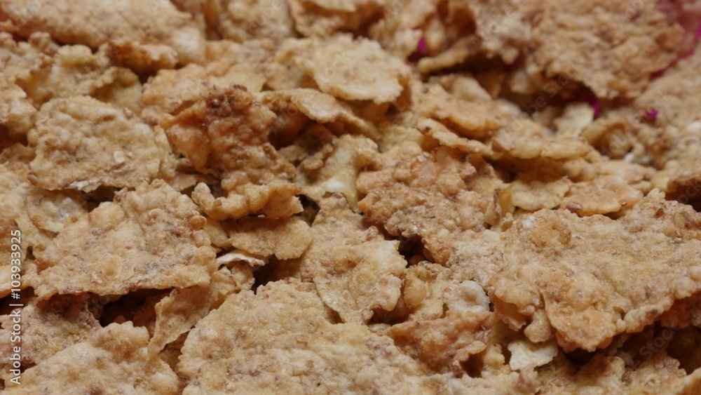 Healthy breakfast cereals high energy morning food in bowl 4K 2160p UHD footage - Rice and wheat cereal filling up plastic bowl 4K 3840X2160 UltraHD video 