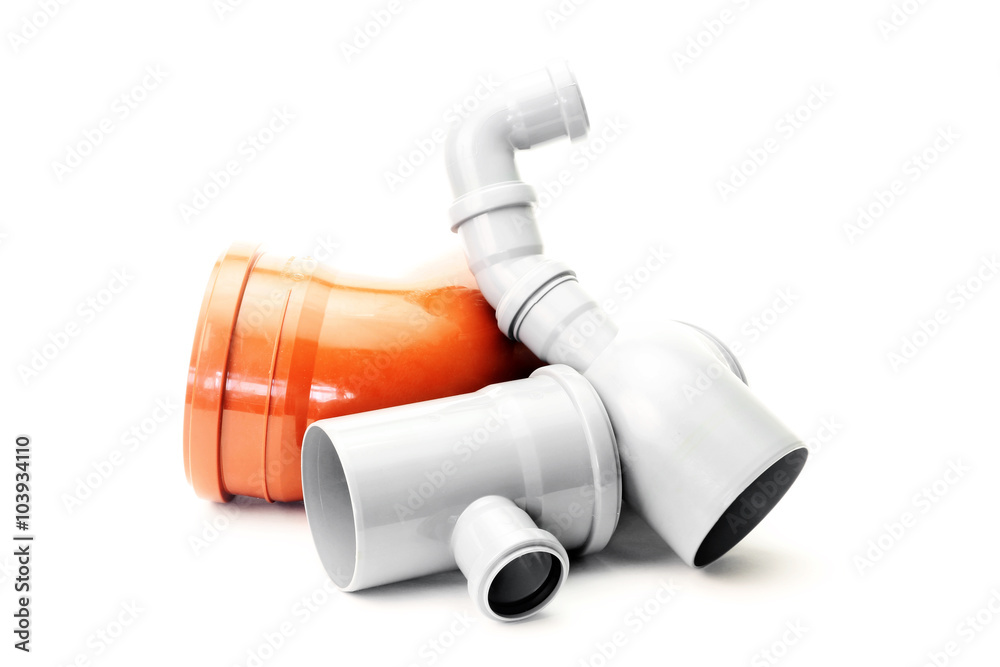 Naklejka premium Composition from plastic sewer pipes, isolated on the white