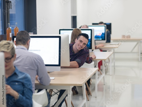 startup business, software developer working on desktop computer