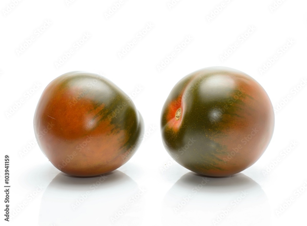 kumato tomatoes isolated on white background kumato tomatoes isolated on white background