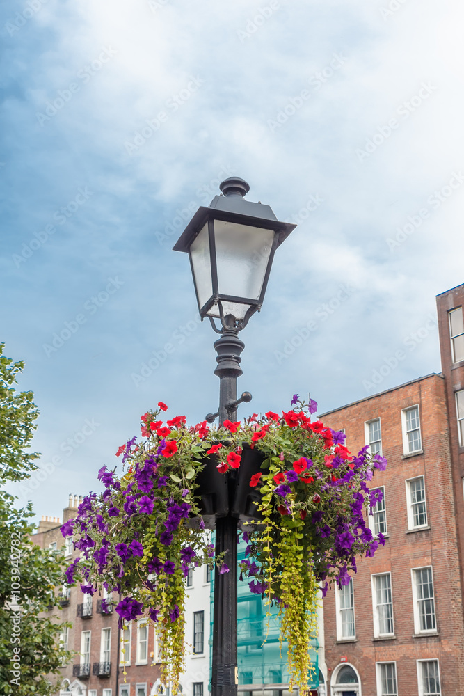 Old-fashioned street lamp against the buildings. Dublin, Ireland.
