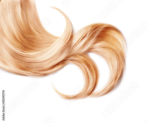 Curl of healthy blond hair isolated on white
