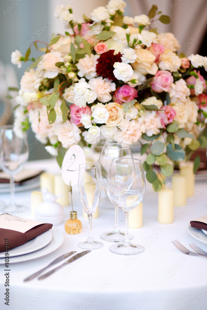 Beautiful table set for some festive event or wedding reception Beautiful table set for some festive event or wedding reception