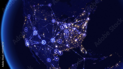 Global communications through the network of connections over North and South America. Concept of internet, social media, traveling or logistics. High resolution texture of city lights. 4k - Ultra HD.