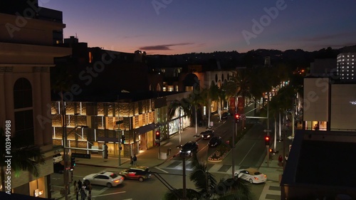 BEVERLY HILLS, CA - Circa February, 2016: A high-angle night establishing shot view of an intersection on Rodeo Drive.  	