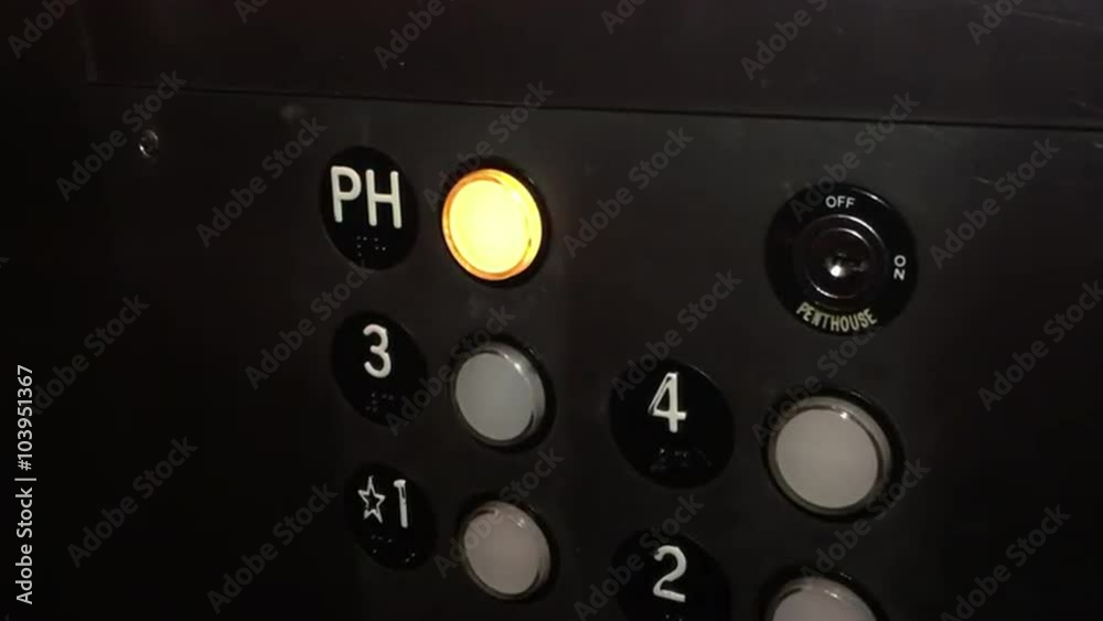 Pushing the PH penthouse button in an elevator. Pushing the PH penthouse button in an elevator.