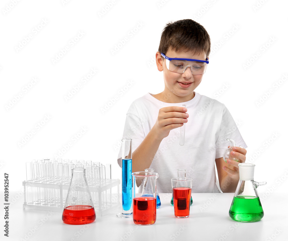 Clever little boy doing a chemical experiments, isolated on white Clever little boy doing a chemical experiments, isolated on white