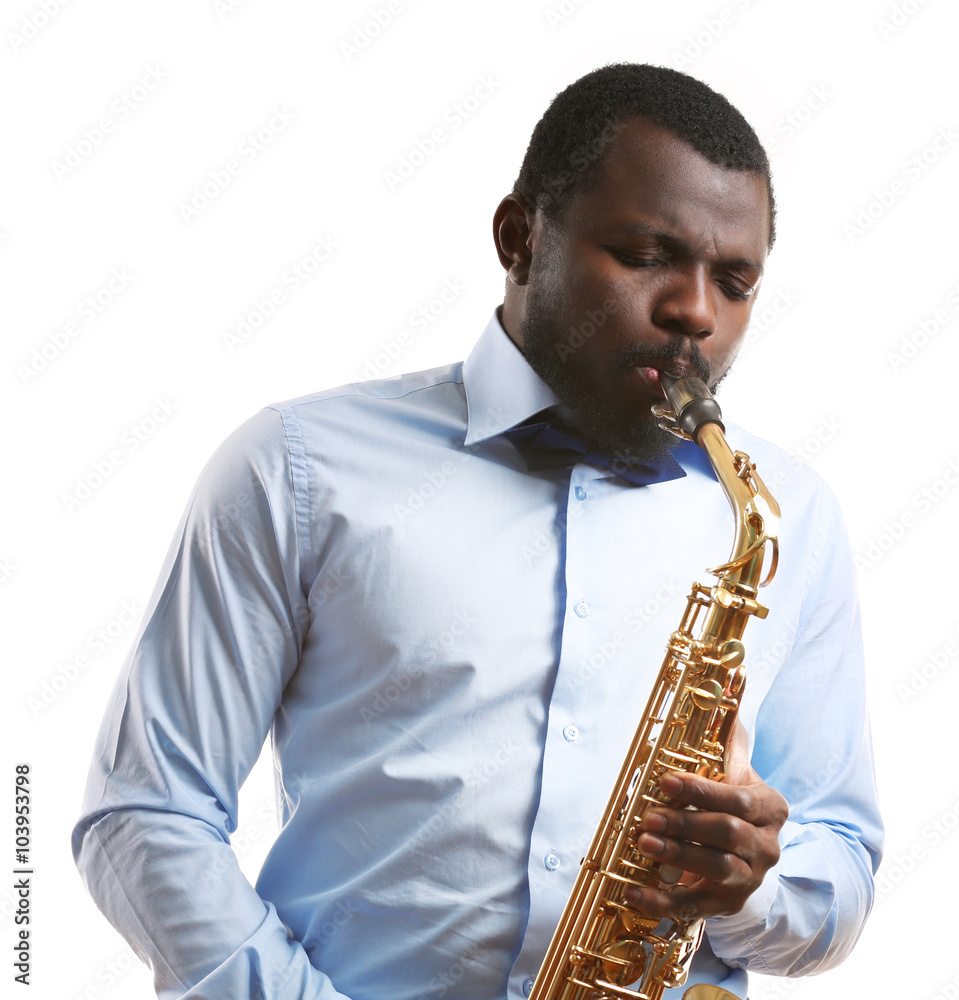 Fototapeta premium African American jazz musician playing the saxophone, isolated on white
